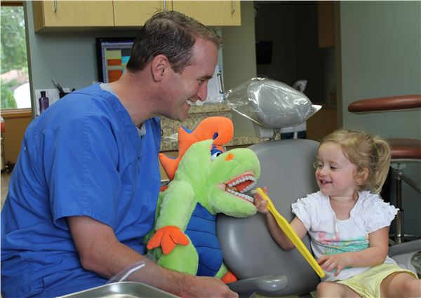 dentist with child patient